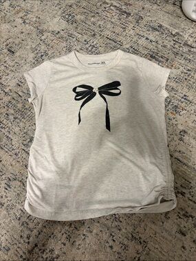 Abercrombie Kids  Light Heather Gray Tee with Black Bow and Graphic
